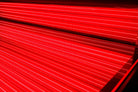 Close up of Helios Solbasium red light therapy LED panels inside the bed