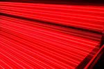Close up of Helios Solbasium red light therapy LED panels inside the bed
